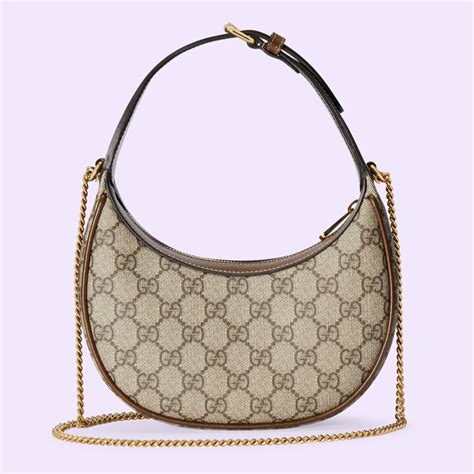 borsa gucci a mezzaluna|Mini borsa a mezzaluna GG Retrò Gucci .